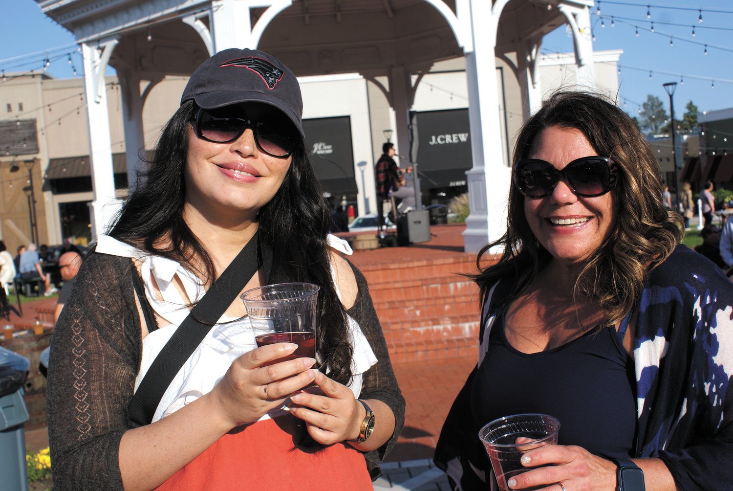 HERE FOR FUN: Wendy Zhu (left) and Jen Colasante were two participants at this past weekend’s Beer Garden. Both graduated from Cranston East.